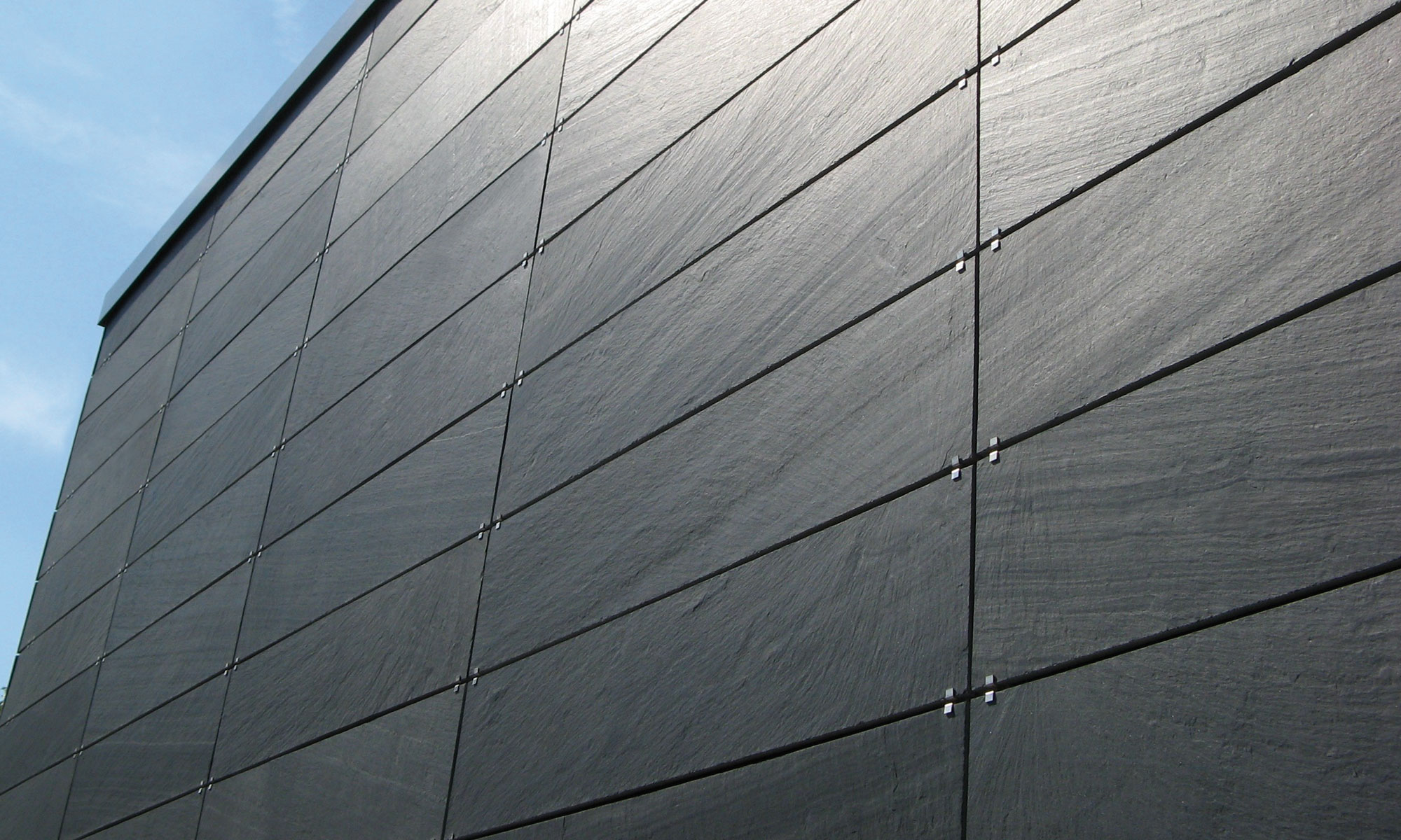 hausfassade verkleiden großformatige deckung